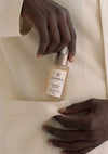 Silky hair oil in amber cosmetic